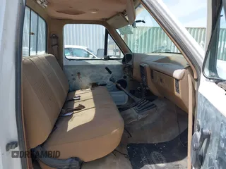 1990 Ford F-150 with VIN 1FTEF14N0LKA50583, listed as a IAAI auction lot 41991153 with 75,504 mi miles. Bid and sale history available at carsss.com. Image 5.