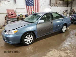 2004 Toyota Camry LE with VIN 4T1BE32K64U812388, listed as a Copart auction lot 82777563 with 209,219 mi miles and Clean Title. Bid and sale history available at carsss.com. Image 1.