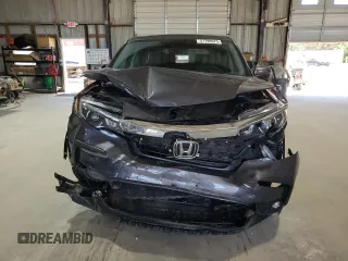 2021 Honda Pilot EX-L with VIN 5FNYF6H53MB044294, listed as a Copart auction lot 57799975 with 59,033 mi miles and Salvage title. Bid and sale history available at DreamBid. Image 5.