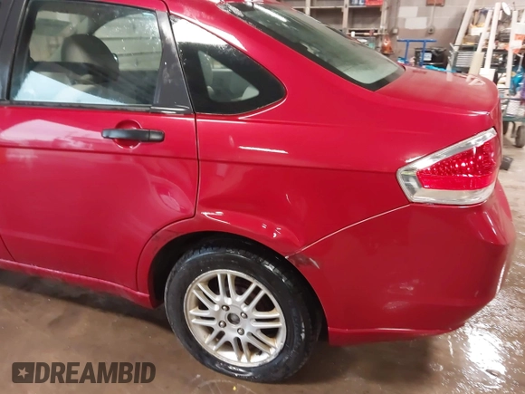2010 Ford Focus SE with VIN 1FAHP3FNXAW263765, listed as a IAAI auction lot 42058813 with 219,009 mi miles and . Bid and sale history available at DreamBid. Image 6.