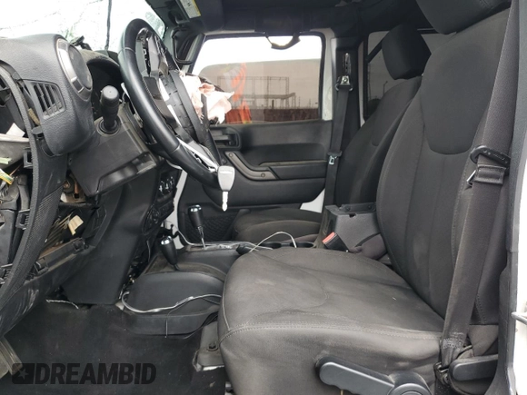 2018 Jeep Wrangler Unlimited Sport S with VIN 1C4BJWDG9JL887033, listed as a Copart auction lot 61785565 with 66,725 mi miles and Salvage title. Bid and sale history available at DreamBid. Image 7.