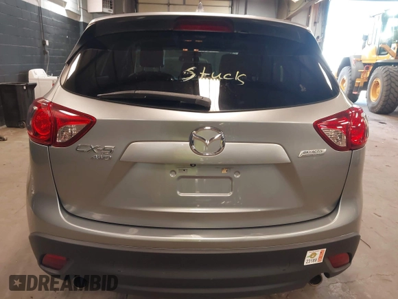2014 Mazda CX-5 Grand Touring with VIN JM3KE4DY9E0373974, listed as a IAAI auction lot 42073693 with 86,755 mi miles. Bid and sale history available at carsss.com. Image 16.