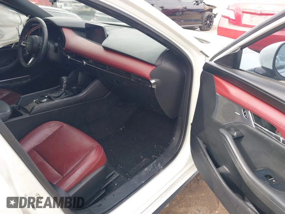 2021 Mazda 3 Premium with VIN JM1BPAML0M1302385, listed as a IAAI auction lot 41397521 with 55,907 mi miles and . Bid and sale history available at DreamBid. Image 5.
