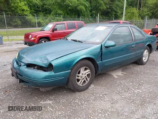 1996 Ford Thunderbird LX z VIN 1FALP62W9TH118637, wystawiony jako IAAI lot #42311641 z przebiegiem 96 361 mil mil oraz . Historia ofert i sprzedaży dostępna na DreamBid. Obrazek 17.