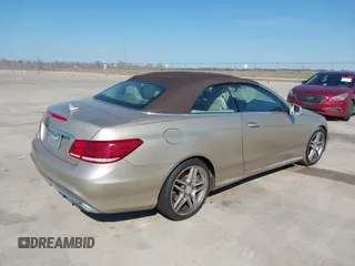 2016 Mercedes-Benz E E 400 with VIN WDDKK6FF6GF327078, listed as a IAAI auction lot 41703023 with 54,442 mi miles. Bid and sale history available at carsss.com. Image 4.