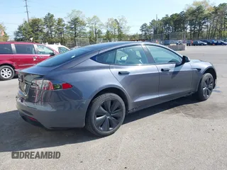 2021 Tesla Model S Plaid with VIN 5YJSA1E66MF456357, listed as a IAAI auction lot 42130286 with 48,010 mi miles. Bid and sale history available at carsss.com. Image 4.
