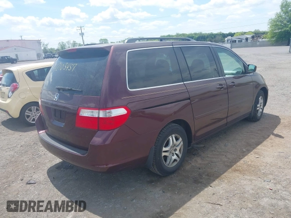 2007 Honda Odyssey EX-L with VIN 5FNRL387X7B421270, listed as a IAAI auction lot 42103457 with 250,980 mi miles. Bid and sale history available at carsss.com. Image 4.