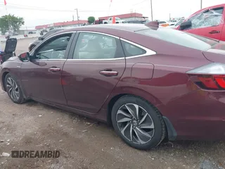 2020 Honda Insight Touring z VIN 19XZE4F93LE010040, wystawiony jako IAAI lot #42240572 z przebiegiem 52 299 mil mil oraz . Historia ofert i sprzedaży dostępna na DreamBid. Obrazek 14.