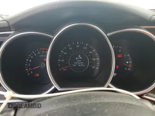 2015 Kia Optima EX с VIN 5XXGN4A70FG389927, выставлен на аукционе Copart как лот 60199955 с пробегом 96 389 миль миль и Списание • Salvage title. История ставок и продаж доступна на DreamBid. Изображение 9.