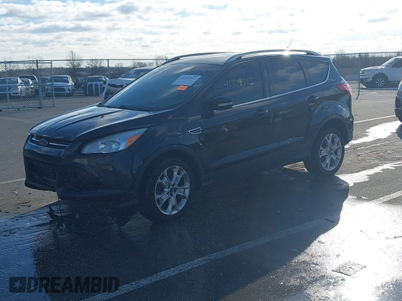 2015 Ford Escape Titanium with VIN 1FMCU0JX8FUC34459, listed as a IAAI auction lot 41394012 with 154,077 mi miles. Bid and sale history available at carsss.com. Image 17.