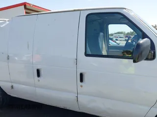 1998 Ford Econoline Cargo with VIN 1FTRE1420WHB15038, listed as a IAAI auction lot 41826051 with 338,809 mi miles. Bid and sale history available at carsss.com. Image 13.