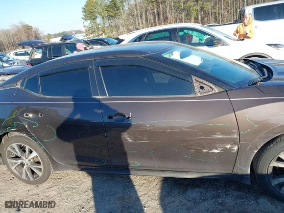 2016 Nissan Maxima 3.5 Platinum with VIN 1N4AA6AP4GC434534, listed as a IAAI auction lot 41642540 with 143,413 mi miles. Bid and sale history available at carsss.com. Image 14.