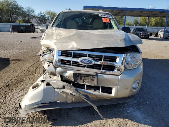 2011 Ford Escape XLT with VIN 1FMCU0D70BKA56239, listed as a Copart auction lot 69469464 with 59,782 mi miles and Salvage Title. Bid and sale history available at carsss.com. Image 4.