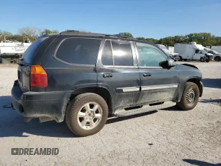 2002 GMC Envoy SLE with VIN 1GKDS13S022512481, listed as a Copart auction lot 74701454 with 0 mi miles and Salvage Title. Bid and sale history available at carsss.com. Image 3.