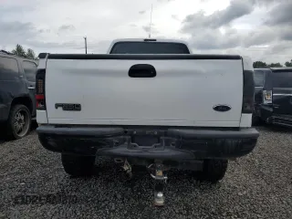 2004 Ford F-250 XL with VIN 1FTNX21P34ED08796, listed as a Copart auction lot 54789995 with 141,634 mi miles and Salvage title. Bid and sale history available at DreamBid. Image 6.