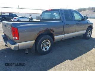 2003 Dodge 1500 ST z VIN 1D7HU18D33J644973, wystawiony jako IAAI lot #41992108 z przebiegiem 176 023 mil mil oraz . Historia ofert i sprzedaży dostępna na DreamBid. Obrazek 4.