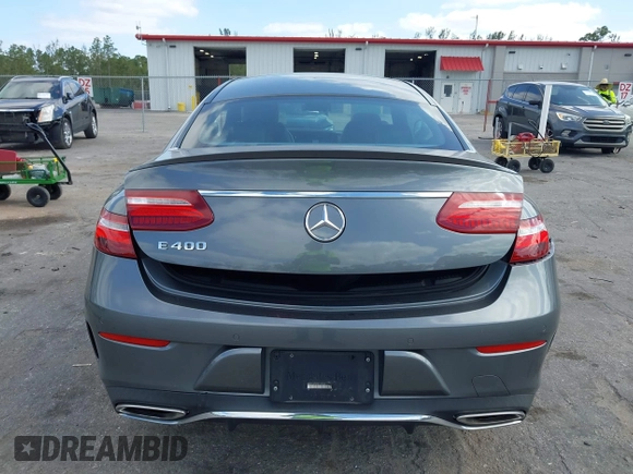 2018 Mercedes-Benz E 400 with VIN WDD1J6FB9JF015064, listed as a IAAI auction lot 42165914 with 95,290 mi miles and . Bid and sale history available at DreamBid. Image 17.