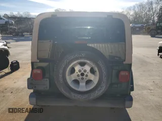 2000 Jeep Wrangler Sahara with VIN 1J4FA59S0YP795198, listed as a Copart auction lot 87920205 with 150,148 mi miles and Salvage Title. Bid and sale history available at carsss.com. Image 6.