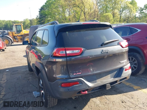 2014 Jeep Cherokee Trailhawk with VIN 1C4PJMBS6EW167517, listed as a IAAI auction lot 41947552 with 233,572 mi miles. Bid and sale history available at carsss.com. Image 3.