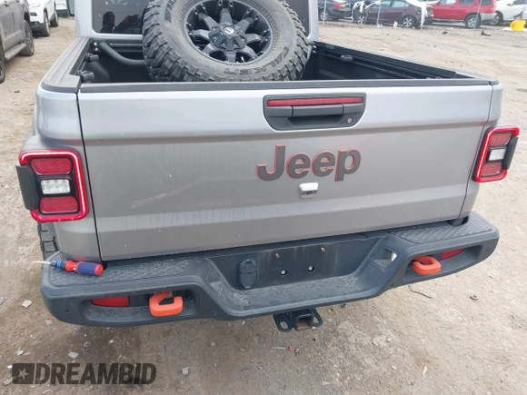 2021 Jeep Gladiator Mojave with VIN 1C6JJTEG9ML519309, listed as a IAAI auction lot 41701544 with 64,461 mi miles and . Bid and sale history available at DreamBid. Image 16.