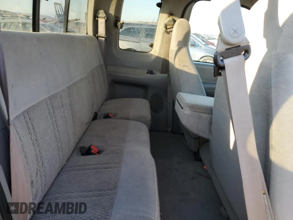 1998 Ford F-150 z VIN 1FTZX18W3WKB01774, wystawiony jako Copart lot #88670315 z przebiegiem 102 301 mil mil oraz Szkoda całkowita • Salvage title. Historia ofert i sprzedaży dostępna na DreamBid. Obrazek 11.