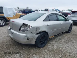 2006 Pontiac G6 6-Cyl z VIN 1G2ZG558064154096, wystawiony jako IAAI lot #41987316 z przebiegiem 221 130 mil mil oraz . Historia ofert i sprzedaży dostępna na DreamBid. Obrazek 4.
