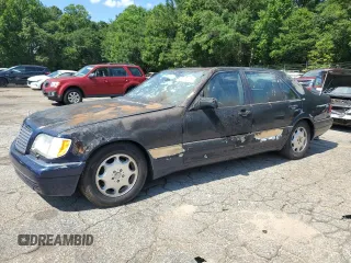 1995 Mercedes-Benz S with VIN WDBGA57E3SA236583, listed as a Copart auction lot 61134125 with Not provided miles and Salvage title. Bid and sale history available at DreamBid. Image 1.