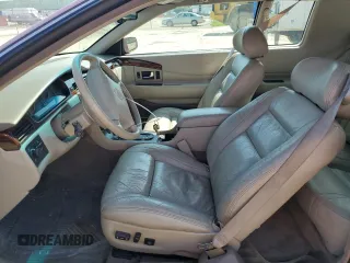1997 Cadillac Eldorado ESC z VIN 1G6EL12Y5VU614955, wystawiony jako Copart lot #56222345 z przebiegiem 62 030 mil mil oraz Tytuł czysty. Historia ofert i sprzedaży dostępna na DreamBid. Obrazek 7.