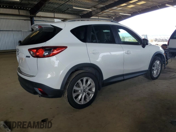 2014 Mazda CX-5 Grand Touring with VIN JM3KE2DY5E0383597, listed as a Copart auction lot 50205545 with 110,052 mi miles and Salvage Title. Bid and sale history available at carsss.com. Image 3.