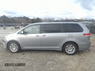 2014 Toyota Sienna XLE with VIN 5TDYK3DC0ES421501, listed as a IAAI auction lot 41672414 with 111,911 mi miles. Bid and sale history available at carsss.com. Image 14.
