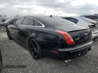 2014 Jaguar XJ with VIN SAJWA2EKXEMV64494, listed as a Copart auction lot 82634004 with 119,811 mi miles and Clean title. Bid and sale history available at DreamBid. Image 2.