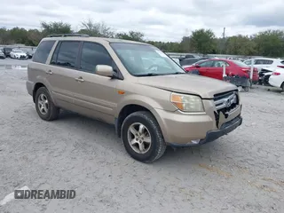 2006 Honda Pilot EX-L with VIN 5FNYF28566B010295, listed as a IAAI auction lot 41654433 with 302,539 mi miles and . Bid and sale history available at DreamBid. Image 1.