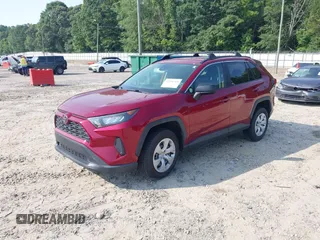 2019 Toyota RAV4 LE with VIN JTMF1RFV9KD029118, listed as a IAAI auction lot 42590704 with 48,976 mi miles and . Bid and sale history available at DreamBid. Image 2.
