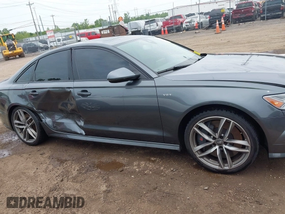 2016 Audi S6 Prestige z VIN WAUH2AFC1GN016187, wystawiony jako IAAI lot #42274744 z przebiegiem 169 821 mil mil oraz . Historia ofert i sprzedaży dostępna na DreamBid. Obrazek 13.
