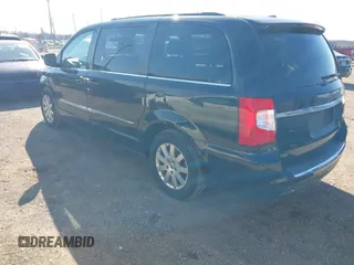 2015 Chrysler Town & Country Touring with VIN 2C4RC1BG9FR626501, listed as a IAAI auction lot 41279210 with 211,206 mi miles and . Bid and sale history available at DreamBid. Image 3.
