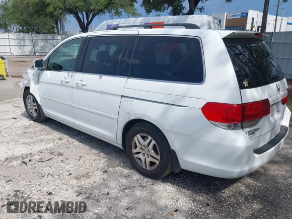 2010 Honda Odyssey EX with VIN 5FNRL3H5XAB015351, listed as a IAAI auction lot 42702296 with 202,919 mi miles and . Bid and sale history available at DreamBid. Image 3.