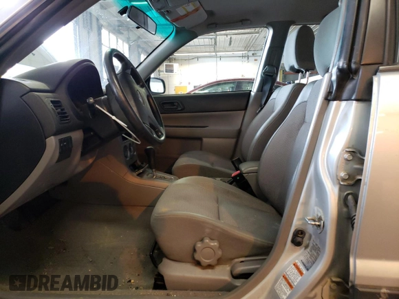 2003 Subaru Forester X with VIN JF1SG63683H766576, listed as a Copart auction lot 56979463 with 147,512 mi miles and Salvage Title. Bid and sale history available at carsss.com. Image 7.
