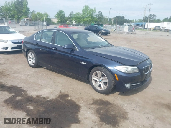 2013 BMW 5 Series 528i with VIN WBAXG5C52DD230956, listed as a IAAI auction lot 42107778 with 126,377 mi miles and . Bid and sale history available at carsss.com. Image 1.
