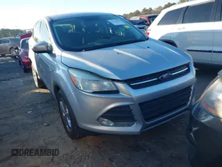 2015 Ford Escape SE with VIN 1FMCU0G92FUC74433, listed as a IAAI auction lot 41262018 with 114,252 mi miles. Bid and sale history available at carsss.com. Image 1.