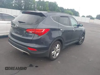 2013 Hyundai Santa Fe Sport z VIN 5XYZU3LAXDG064239, wystawiony jako IAAI lot #42296861 z przebiegiem 165 872 mil mil oraz . Historia ofert i sprzedaży dostępna na DreamBid. Obrazek 4.