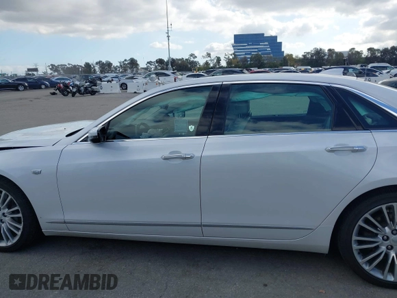 2016 Cadillac CT6 Luxury AWD with VIN 1G6KD5RSXGU154557, listed as a IAAI auction lot 41550199 with 102,536 mi miles and . Bid and sale history available at DreamBid. Image 14.