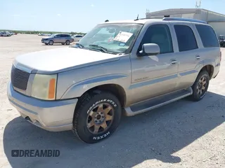 2005 Cadillac Escalade with VIN 1GYEK63NX5R141147, listed as a IAAI auction lot 42518716 with 231,540 mi miles and . Bid and sale history available at DreamBid. Image 2.