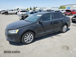 2014 Volkswagen Jetta SE with VIN 3VWD17AJ0EM268515, listed as a Copart auction lot 59977225 with 163,365 mi miles and Salvage title. Bid and sale history available at DreamBid. Image 1.