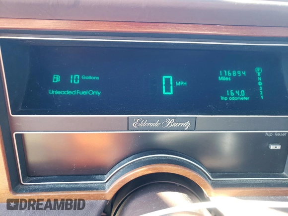1988 Cadillac Eldorado with VIN 1G6EL1153JU632470, listed as a Copart auction lot 78507684 with 176,894 mi miles and Salvage Title. Bid and sale history available at DreamBid. Image 9.