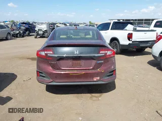 2018 Honda Clarity z VIN JHMZC5F14JC008290, wystawiony jako IAAI lot #42178514 z przebiegiem 49 119 mil mil oraz . Historia ofert i sprzedaży dostępna na DreamBid. Obrazek 16.