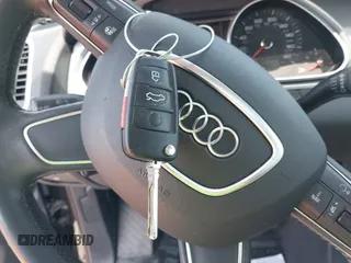 2014 Audi Q7 Premium Plus with VIN WA1LMAFE5ED020880, listed as a IAAI auction lot 42010201 with 123,384 mi miles and . Bid and sale history available at DreamBid. Image 11.