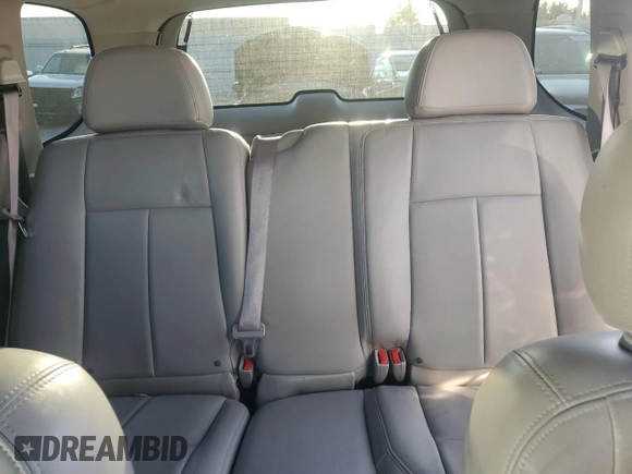 2006 GMC Envoy Denali with VIN 1GKET63M662228794, listed as a Copart auction lot 70802804 with 134,323 mi miles and Salvage Title. Bid and sale history available at DreamBid. Image 10.