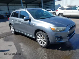 2014 Mitsubishi Outlander SE z VIN 4A4AP4AU1EE009527, wystawiony jako IAAI lot #42064866 z przebiegiem 171 310 mil mil oraz . Historia ofert i sprzedaży dostępna na DreamBid. Obrazek 1.