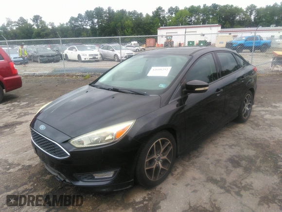2015 Ford Focus SE with VIN 1FADP3F27FL304883, listed as a IAAI auction lot 42688252 with 90,590 mi miles and . Bid and sale history available at DreamBid. Image 2.