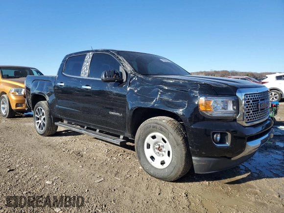 2020 GMC Canyon 4WD Denali with VIN 1GTG6EEN2L1131363, listed as a Copart auction lot 83033354 with 52,694 mi miles and Salvage Title. Bid and sale history available at carsss.com. Image 4.